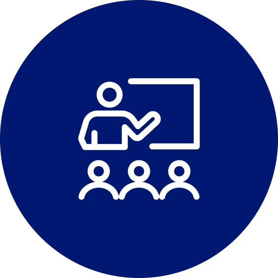 A blue circle with a person teaching in front of three people.